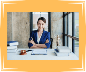 Female divorce mediator sitting behind a desk.