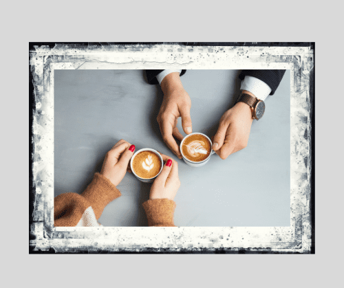 Hands of man and woman each holding a cup of coffee meant to signify mediation and collaborative divorce options. 