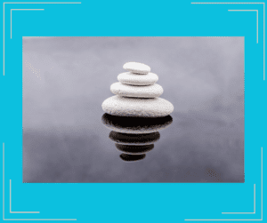 White rocks stacked on water